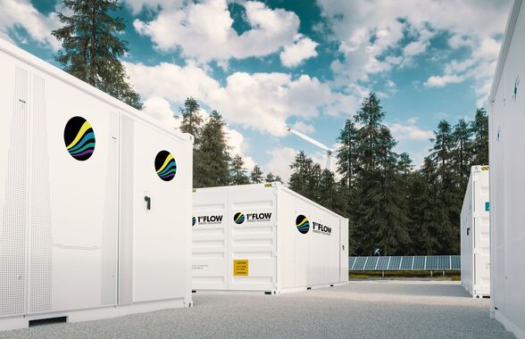 Große weiße Seecontainer mit 1st-Flow-Logo